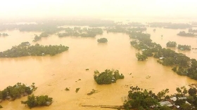 বন্যায় ভেসে যাওয়া ১০ বছরের আরিয়ানের পরিবার